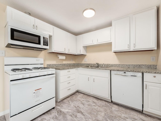 3198 Benham Ct, Columbus, OH 43232 - kitchen featuring white cabinetry, marble finish floor, a sink, and white appliances