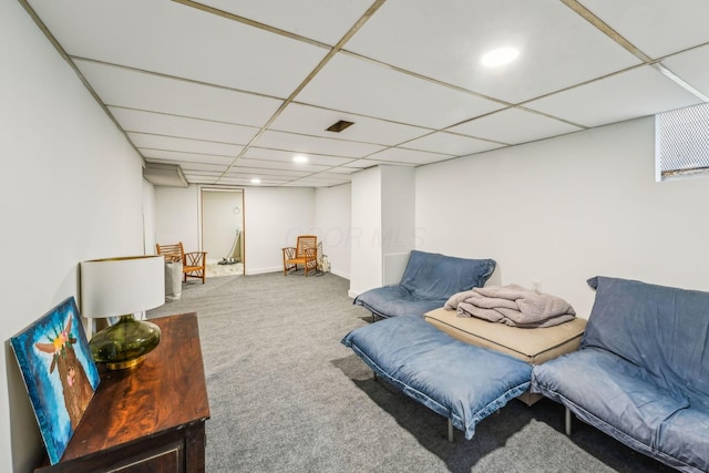 1329 Studer Ave, Columbus, OH 43206 - living area with carpet flooring and a paneled ceiling