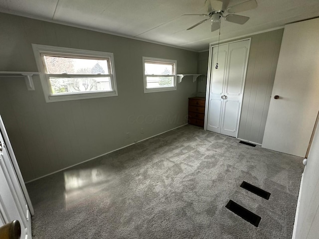 6320 Cartwright Ln N, Dublin, OH 43016 - unfurnished bedroom featuring carpet, visible vents, a closet, and a ceiling fan