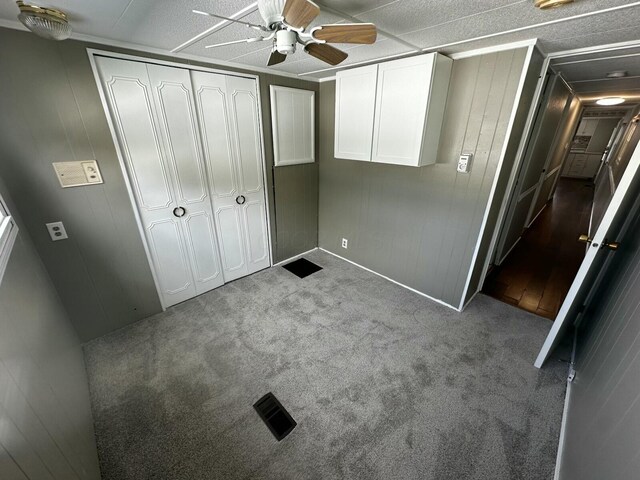 6320 Cartwright Ln N, Dublin, OH 43016 - unfurnished bedroom featuring a closet, ceiling fan, baseboards, and carpet