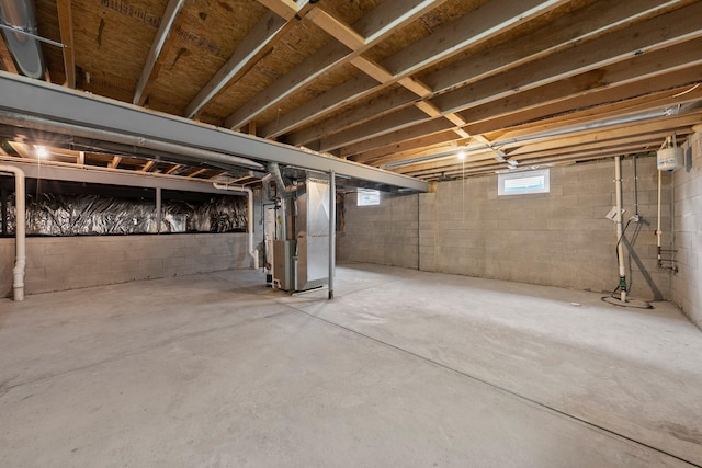 below grade area featuring heating unit