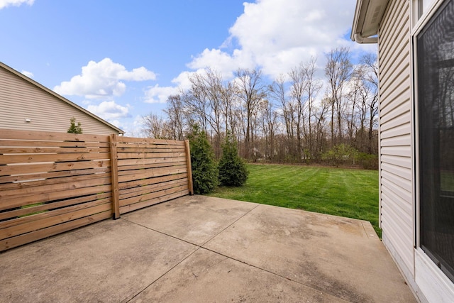 view of patio / terrace featuring fence