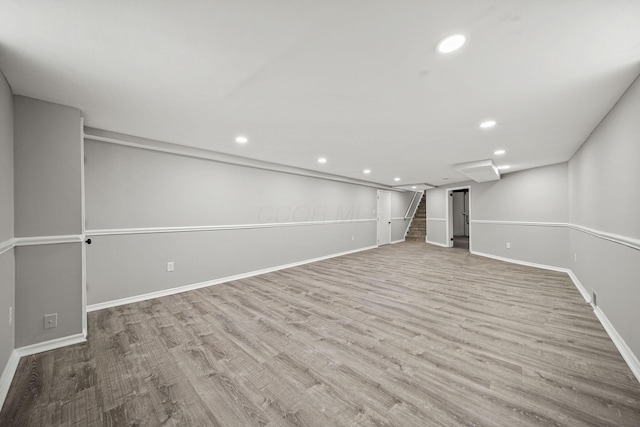 2960 Berwick Blvd, Columbus, OH 43209 - finished below grade area featuring recessed lighting, baseboards, wood finished floors, and stairway