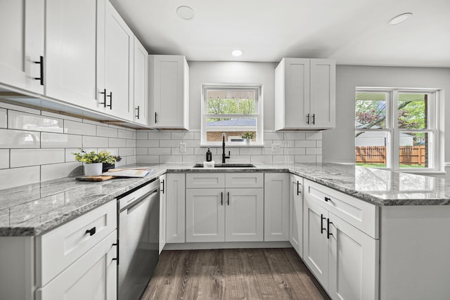 2960 Berwick Blvd, Columbus, OH 43209 - kitchen with a sink, dishwasher, a peninsula, healthy amount of natural light, and recessed lighting