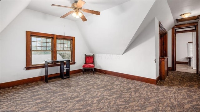 bonus room featuring baseboards, vaulted ceiling, and carpet