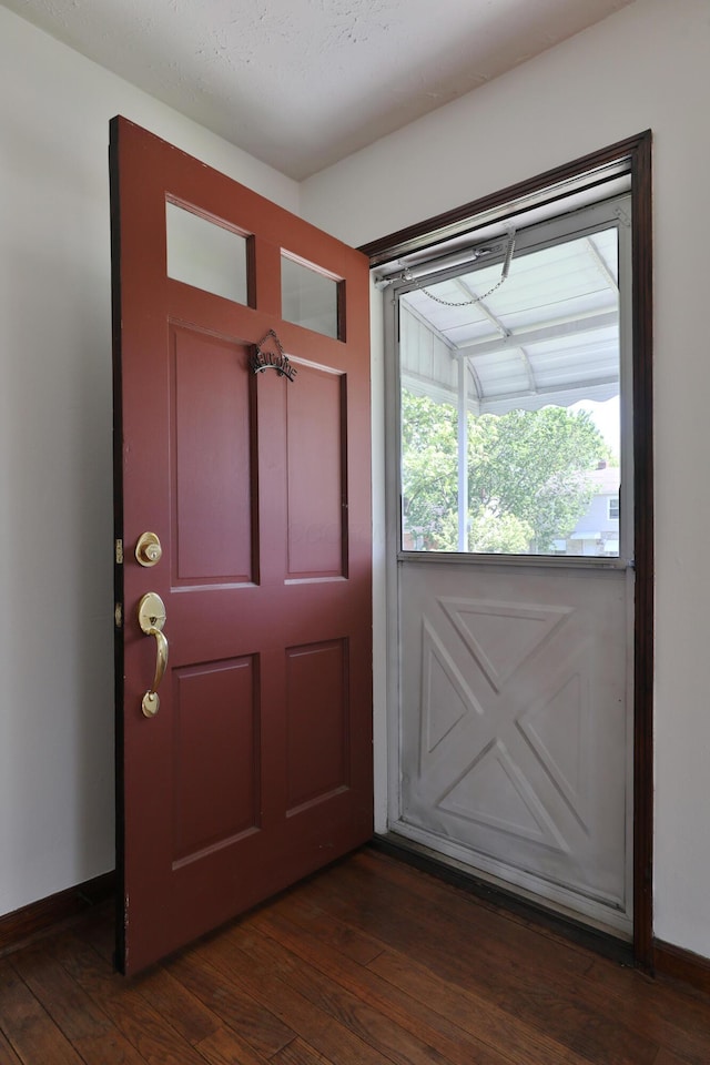 3113 Oaklawn St, Columbus, OH 43224 - foyer entrance featuring dark wood-type flooring and baseboards