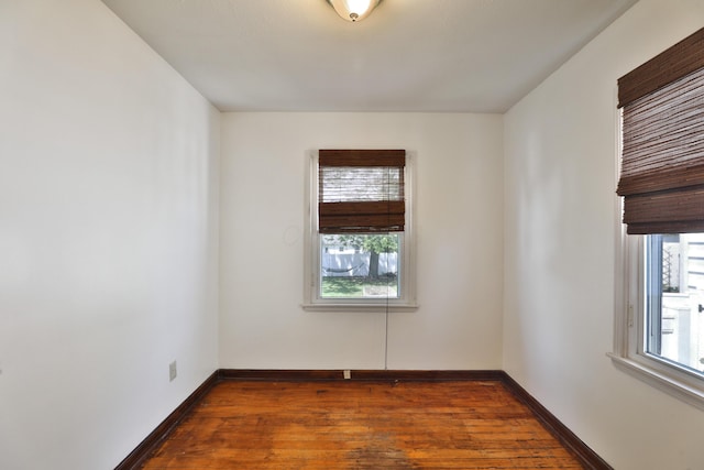 3113 Oaklawn St, Columbus, OH 43224 - empty room with dark wood-style flooring and baseboards
