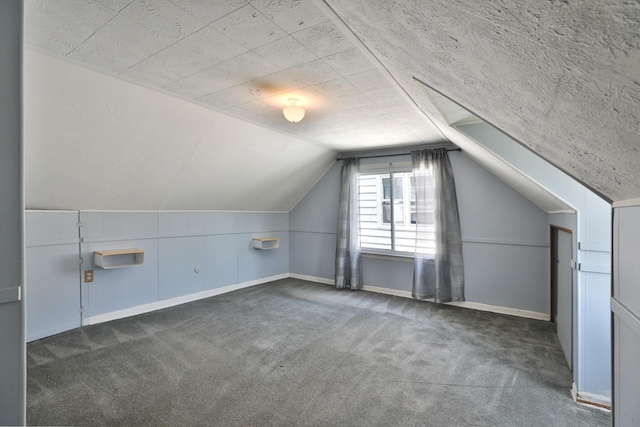 3113 Oaklawn St, Columbus, OH 43224 - additional living space with carpet, lofted ceiling, and baseboards