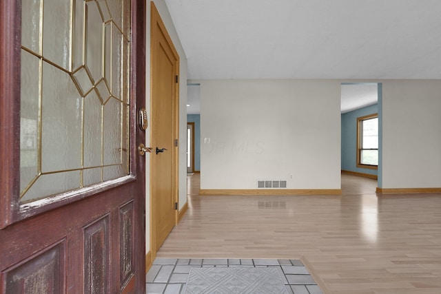 441 Gentlewind Dr, Westerville, OH 43081 - foyer entrance with baseboards, wood finished floors, and visible vents