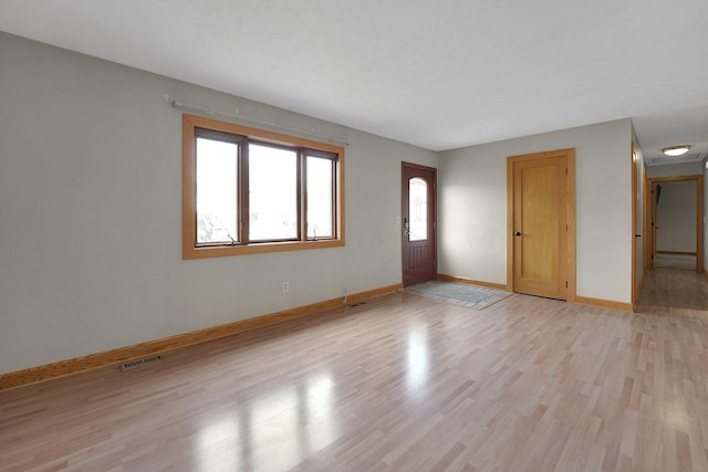 441 Gentlewind Dr, Westerville, OH 43081 - interior space featuring baseboards, visible vents, light wood-type flooring, and a wealth of natural light