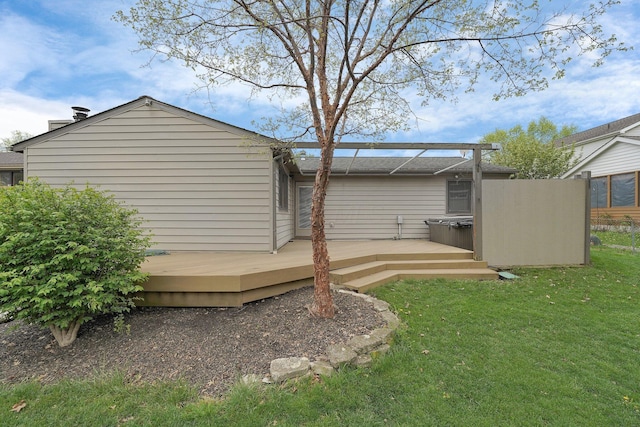 441 Gentlewind Dr, Westerville, OH 43081 - back of property featuring a hot tub, a deck, and a lawn