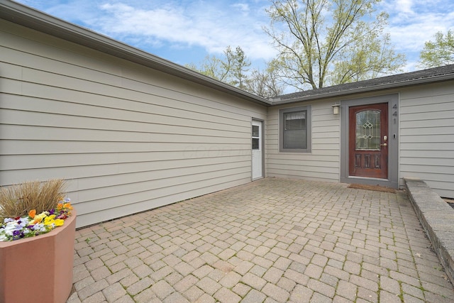 441 Gentlewind Dr, Westerville, OH 43081 - view of exterior entry featuring a patio