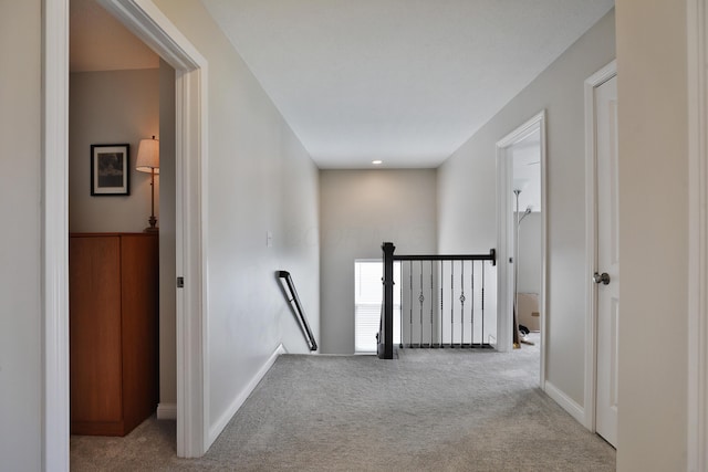 6134 Glade Run Rd, Hilliard, OH 43026 - corridor featuring an upstairs landing, carpet floors, and baseboards