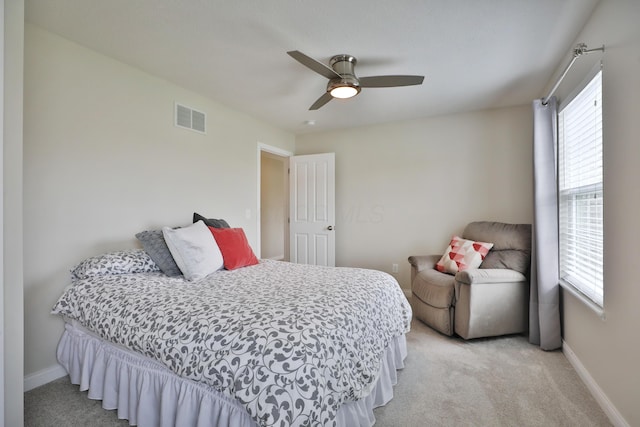 6134 Glade Run Rd, Hilliard, OH 43026 - bedroom with light carpet, baseboards, and a ceiling fan