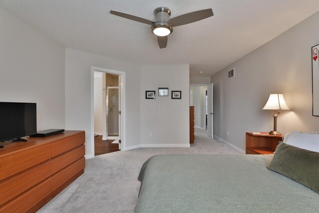 6134 Glade Run Rd, Hilliard, OH 43026 - bedroom featuring light colored carpet, baseboards, and a ceiling fan