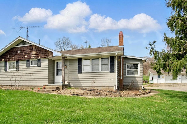 5235 Raiders Rd, Frazeysburg, OH 43822 - ranch-style house with a chimney and a front lawn