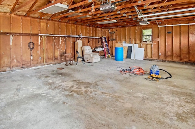 5235 Raiders Rd, Frazeysburg, OH 43822 - garage featuring a garage door opener