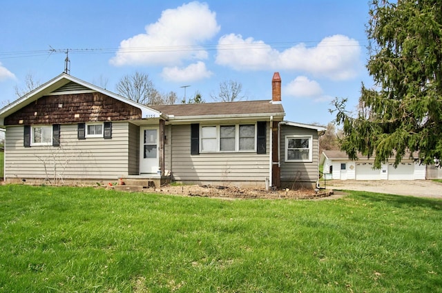 5235 Raiders Rd, Frazeysburg, OH 43822 - ranch-style home featuring a chimney and a front lawn