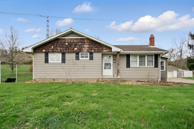 5235 Raiders Rd, Frazeysburg, OH 43822 - single story home with a front yard and a chimney