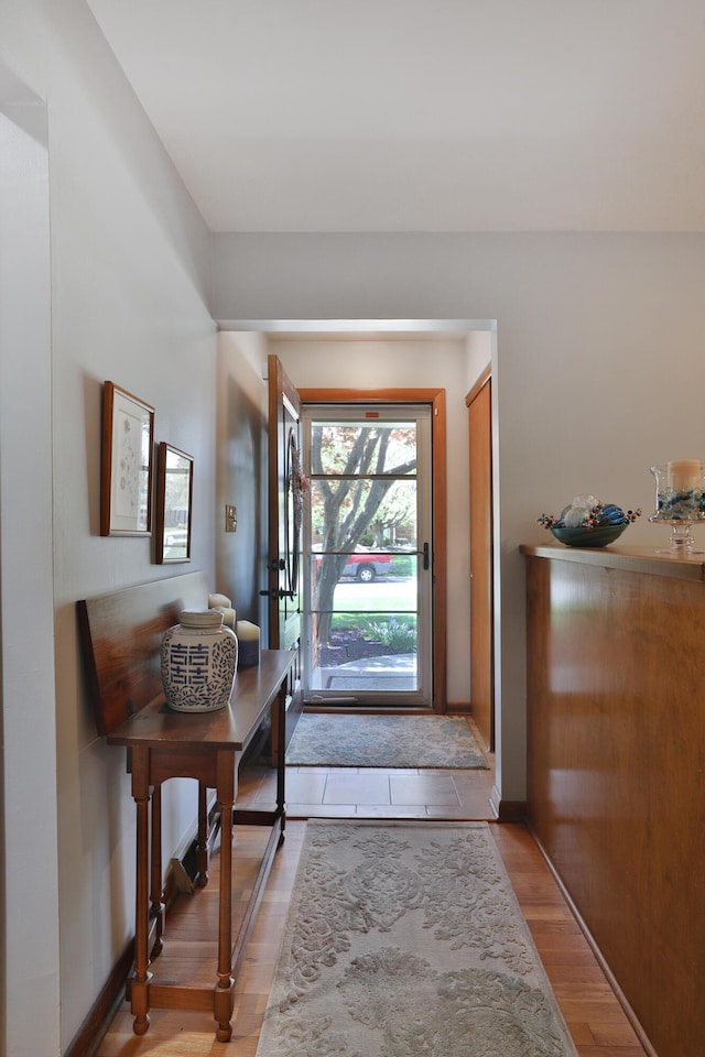5580 Millington Rd, Columbus, OH 43235 - foyer entrance with baseboards and light wood-style floors