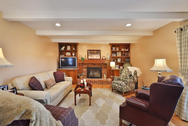 5580 Millington Rd, Columbus, OH 43235 - living area featuring recessed lighting, wood finished floors, beamed ceiling, and a fireplace