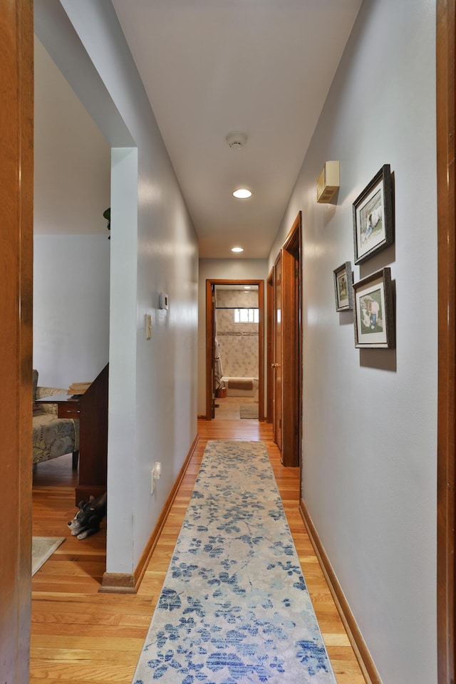 5580 Millington Rd, Columbus, OH 43235 - hallway with baseboards, recessed lighting, and light wood-style floors