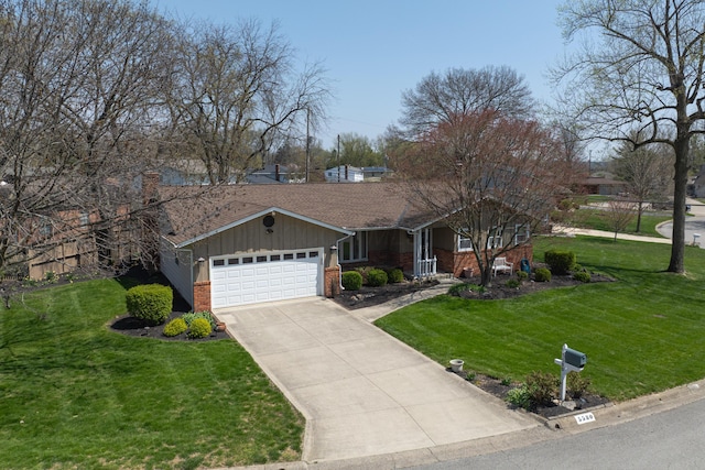 5580 Millington Rd, Columbus, OH 43235 - ranch-style home featuring board and batten siding, brick siding, a garage, driveway, and a front lawn