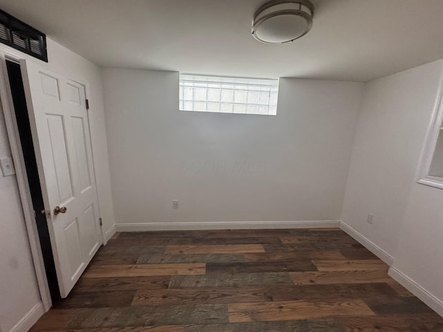 4620 Boynton Pl, Columbus, OH 43227 - below grade area featuring baseboards and wood finished floors