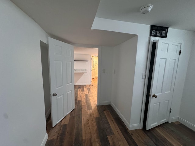 4620 Boynton Pl, Columbus, OH 43227 - hallway with dark wood-type flooring and baseboards