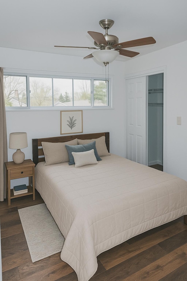 4620 Boynton Pl, Columbus, OH 43227 - bedroom with a ceiling fan, wood finished floors, a closet, and multiple windows