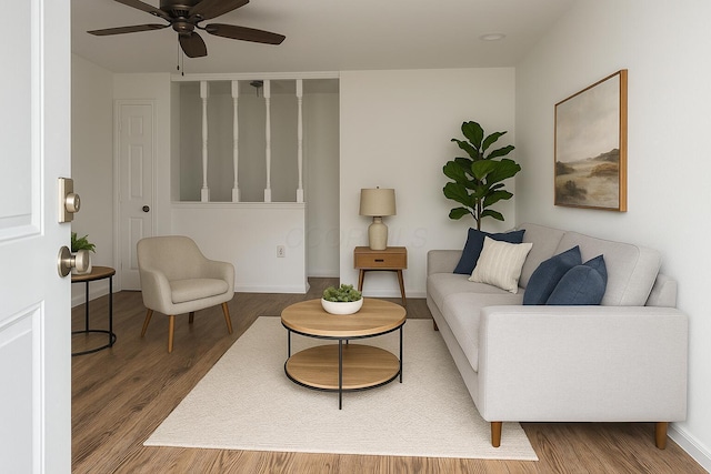 4620 Boynton Pl, Columbus, OH 43227 - living room with baseboards, wood finished floors, and ceiling fan