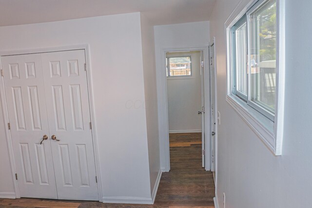 4620 Boynton Pl, Columbus, OH 43227 - hall featuring baseboards and dark wood-style floors