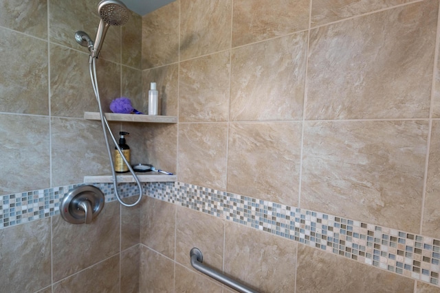 details featuring a tile shower