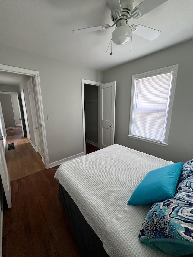 2851 Melva Ave, Columbus, OH 43224 - bedroom featuring dark wood-style floors, baseboards, and ceiling fan
