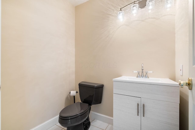 1354 Hemlock Ct NE, Lancaster, OH 43130 - half bathroom featuring baseboards, toilet, vanity, and tile patterned floors