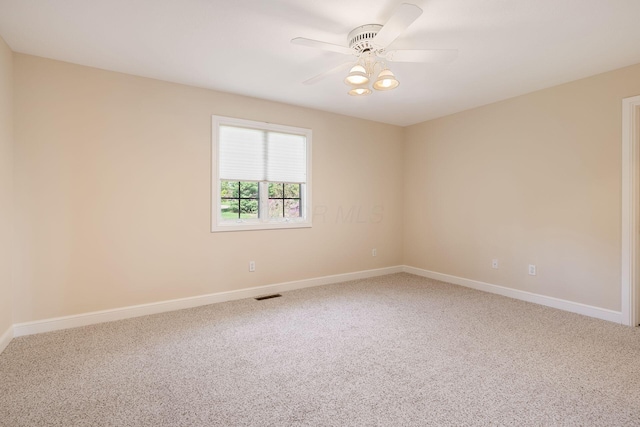 1354 Hemlock Ct NE, Lancaster, OH 43130 - carpeted empty room with visible vents, baseboards, and ceiling fan