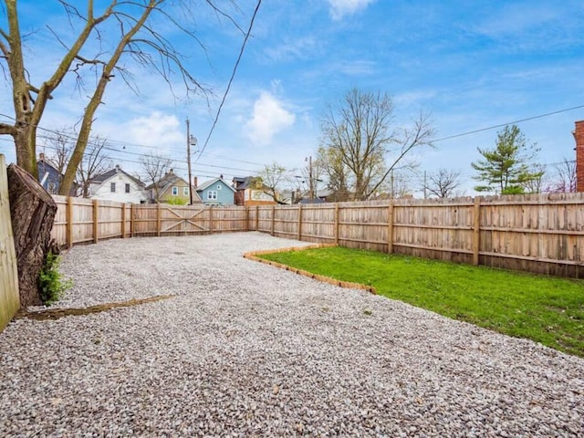 85 Dana Ave, Columbus, OH 43222 - view of yard with a residential view, a patio area, and a fenced backyard