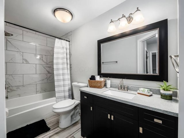85 Dana Ave, Columbus, OH 43222 - bathroom featuring shower / bath combo, vanity, and toilet