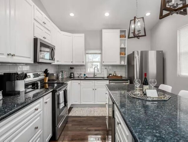 85 Dana Ave, Columbus, OH 43222 - kitchen featuring recessed lighting, dark wood finished floors, appliances with stainless steel finishes, and a sink