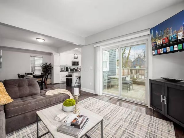 85 Dana Ave, Columbus, OH 43222 - living area featuring baseboards and wood finished floors