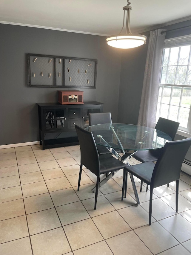 751 Vicksburg Dr, Mansfield, OH 44904 - dining space with ornamental molding, light tile patterned floors, and baseboards