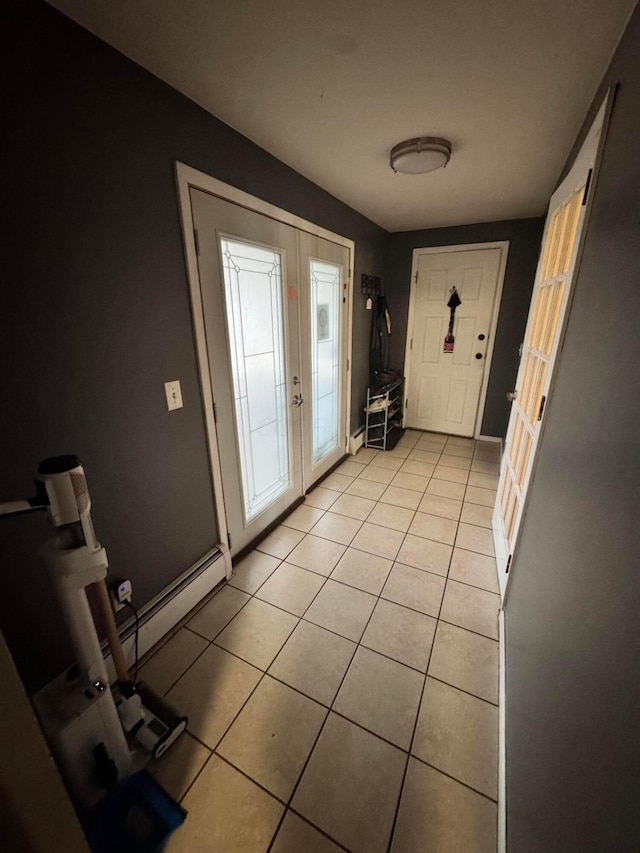 751 Vicksburg Dr, Mansfield, OH 44904 - doorway with light tile patterned flooring, a baseboard heating unit, and french doors