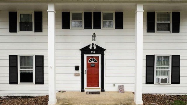 751 Vicksburg Dr, Mansfield, OH 44904 - view of exterior entry featuring cooling unit and a porch