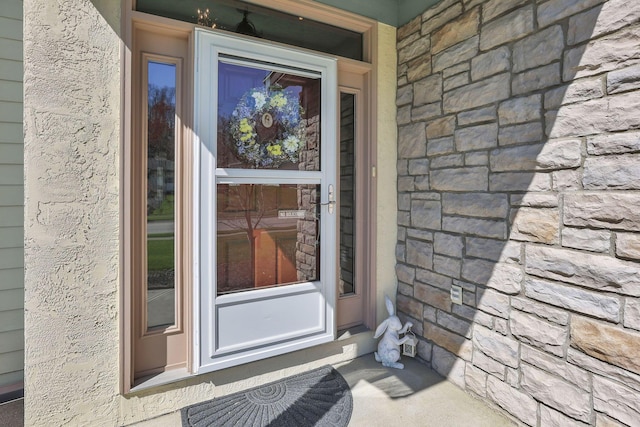 665 Cherrington Rd, Westerville, OH 43081 - doorway to property featuring stone siding