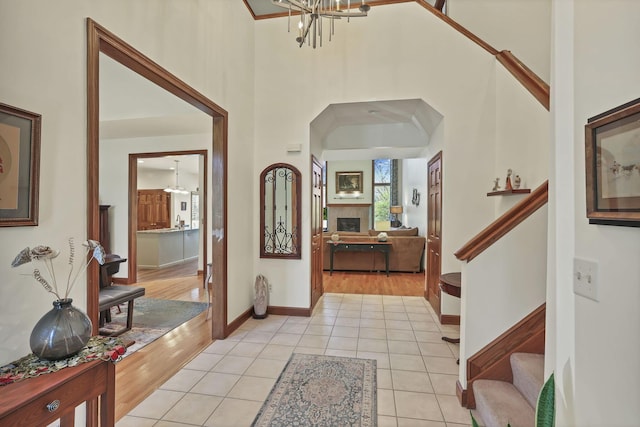 665 Cherrington Rd, Westerville, OH 43081 - foyer entrance with a chandelier, a high ceiling, and stairs