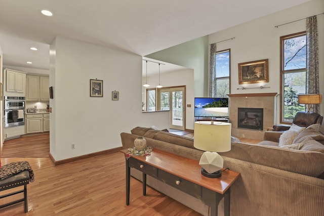 665 Cherrington Rd, Westerville, OH 43081 - living area featuring recessed lighting, a high end fireplace, light wood finished floors, and baseboards