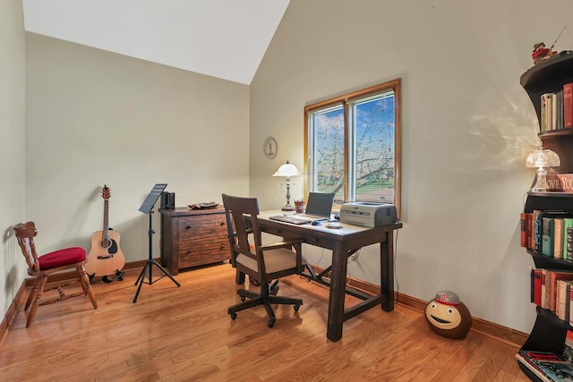 665 Cherrington Rd, Westerville, OH 43081 - home office featuring high vaulted ceiling, baseboards, and light wood-style flooring