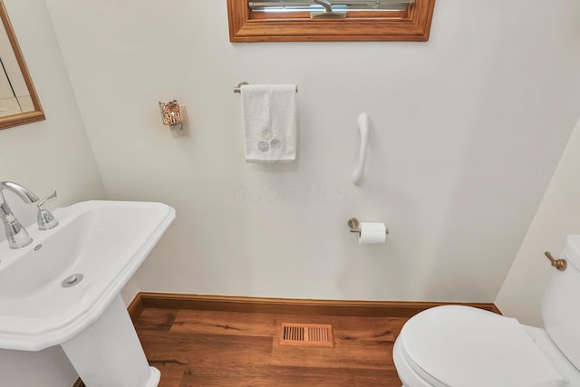 665 Cherrington Rd, Westerville, OH 43081 - bathroom with wood finished floors, visible vents, and toilet