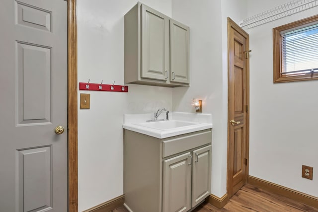 665 Cherrington Rd, Westerville, OH 43081 - bathroom with baseboards, wood finished floors, and vanity