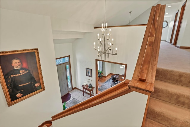 665 Cherrington Rd, Westerville, OH 43081 - stairs with high vaulted ceiling, carpet flooring, baseboards, and a notable chandelier